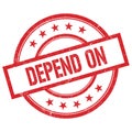 DEPEND ON text written on red vintage round stamp