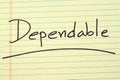 Dependable On A Yellow Legal Pad Royalty Free Stock Photo