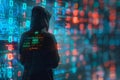 Depicting a abstract hacker silhouette in a hood against binary code and a digital screen background, data security concept w
