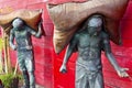 Statues of men carrying sacks of rice in songkhla thailand
