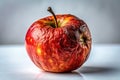 A Depictive Image of a Rotten Red Apple Exploring Decay Aging and Health Implications in a Visual Representation Royalty Free Stock Photo