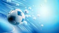 It depicts a classic blue and white soccer ball in motion on a dynamic blue abstract background. Royalty Free Stock Photo