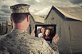 Deployed Military Man Chats with Family Royalty Free Stock Photo