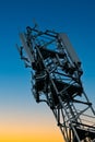 Deployment of the 5G network. Laying antennas on a mobile phone mast in the winter atmosphere. France, Gironde, February