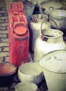 Deposit of a junk shop with old aluminum container and an ancien