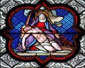 Deposition from the Cross, stained glass window in the Basilica of Saint Clotilde in Paris Royalty Free Stock Photo