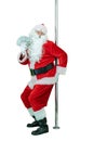 Depraved Santa pole dancer, holds fan of dollars money notes. Lustful Santa Claus dances with pole on white background Royalty Free Stock Photo