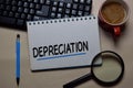 Depreciation write on a book isolated on office desk