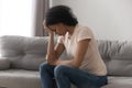 Stressed black woman suffering from depression at home Royalty Free Stock Photo