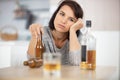 depressed alcoholic young beautiful woman Royalty Free Stock Photo