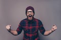 Depressed angry hipster bearded man yelling and screaming Royalty Free Stock Photo