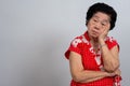 Depressed Asian senior woman lonely disappointed and lose memory in isolated white background. Portrait old woman ill sick