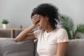 Depressed black woman feel upset mourning at home Royalty Free Stock Photo