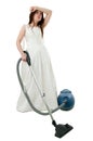 Depressed bride with vacuum cleaner Royalty Free Stock Photo
