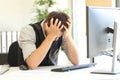 Depressed businessman after bankruptcy at office