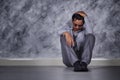 Depressed businessman sitting on the floor Royalty Free Stock Photo