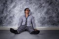 Depressed businessman sitting on the floor Royalty Free Stock Photo