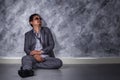 Depressed businessman sitting on the floor Royalty Free Stock Photo