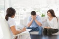 Depressed couple talking with their therapist Royalty Free Stock Photo