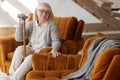 Depressed elderly woman looking at the empty space near her Royalty Free Stock Photo