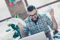 Depressed frustrated crazy freelancer dressed in checkered shirt Royalty Free Stock Photo