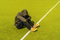 Depressed and hopeless man sitting alone after using drugs and drunk alcohol Royalty Free Stock Photo