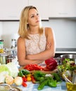 Depressed housewife feeling blue indoors Royalty Free Stock Photo