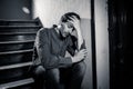 Latin man feeling sad and worried about life in depression mental health concept