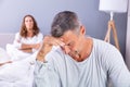 Depressed Man Sitting On Bed Royalty Free Stock Photo