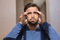 Depressed man sitting on floor Royalty Free Stock Photo