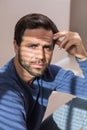 Depressed man sitting on floor Royalty Free Stock Photo