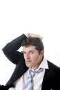 Depressed overworked business man with hand on his head Royalty Free Stock Photo