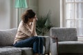 Depressed pensive middle aged woman lost in thoughts at home Royalty Free Stock Photo