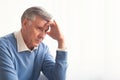 Depressed Senior Man Thinking About Problems Sitting At Home Royalty Free Stock Photo