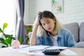 Depressed and stressed young asian woman meet financial problem and she has no money to pay credit card debt bill after unemployed Royalty Free Stock Photo