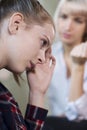 Depressed Teenage Girl Meeting With Counselor Royalty Free Stock Photo