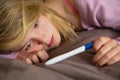 Depressed Teenage Girl Sitting In Bedroom Royalty Free Stock Photo