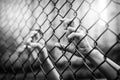 Depressed, trouble and lives matter. Black&White filter, women hand on chain-link fence Royalty Free Stock Photo