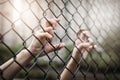 Depressed, trouble and solution. Women hand on chain-link fence. Royalty Free Stock Photo