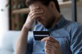 Depressed unhappy young man having financial problems. Royalty Free Stock Photo