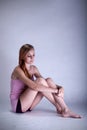 Depressed woman sitting on the floor Royalty Free Stock Photo