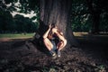 Depressed woman sittng under a tree Royalty Free Stock Photo