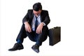 Depressed young Asian businessman isolated on white Royalty Free Stock Photo