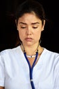 Depressed Young Colombian Female Nurse Wearing Scrubs Royalty Free Stock Photo