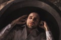 Depressed young man mental health in bathtub in bathroom at home Royalty Free Stock Photo