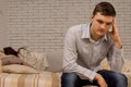 Depressed young man sulking after an argument Royalty Free Stock Photo