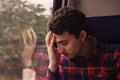Sad upset man traveling by train. Royalty Free Stock Photo