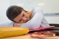 Depressed young woman with computer