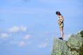 Depression concept. Soldier girl. Military female. Observing point. Brave girl dangerous cliff. Suicidal mood. Brave and Royalty Free Stock Photo