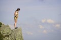 Depression concept. Soldier girl. Military female. Observing point. Brave girl dangerous cliff. Suicidal mood. Brave and Royalty Free Stock Photo